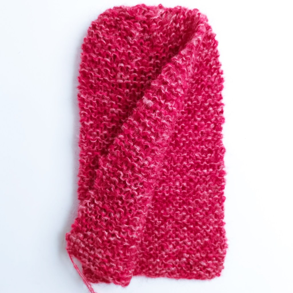 Chunky garter stitch mohair bonnet with long ties – free seamless knitting pattern for adults