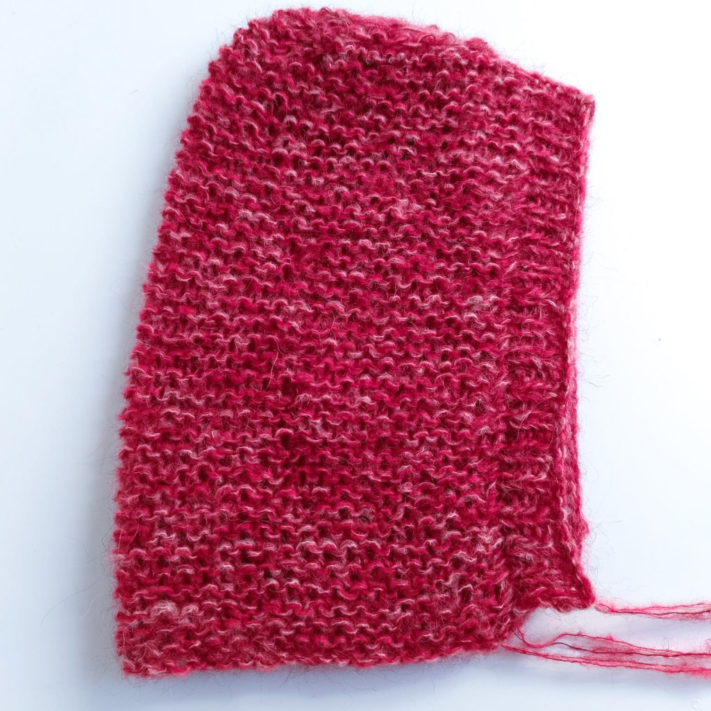 Chunky garter stitch mohair bonnet with long ties – free seamless knitting pattern for adults